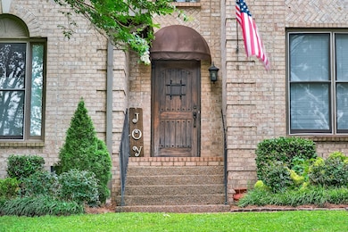 This gorgeous front door is solid mahogany and came from South America.