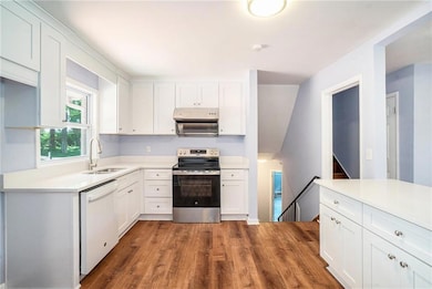 New white cabinets with quartz tops
