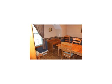 Formal dining room, with built in desk.