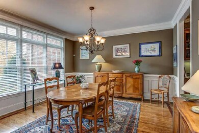 Gracious formal dining room opens to the other living areas and features a butler's pantry.