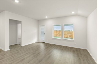 Unfurnished room with recessed lighting, light wood-type flooring, and vaulted ceiling