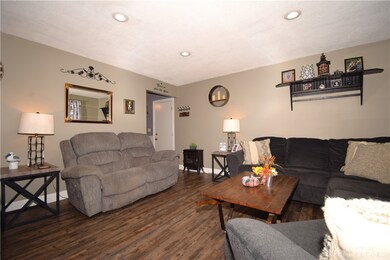 Living room with door to dining area in far corner