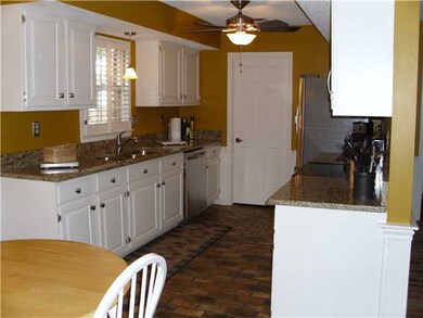 triple sink, plantation shutters