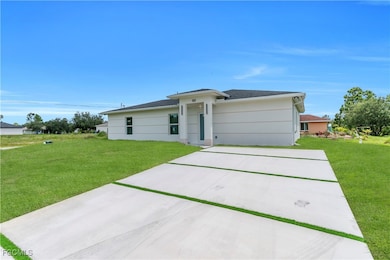 101 W 9th St, Lehigh Acres, FL 33972 - photo 2