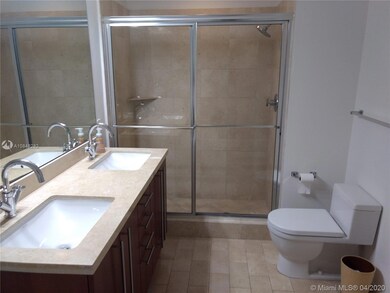 Master bath with walk in shower, separate tub and double sink vanity