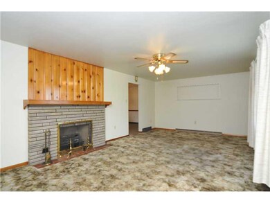 Living Room. Wood Burning Fireplace