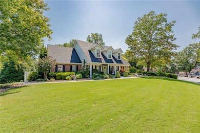 Beautiful landscaping with full yard sprinkler system.