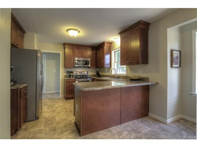 Large updated kitchen complete with stainless stee