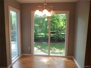 Eat-in area. New chandelier. Lots of light. Great