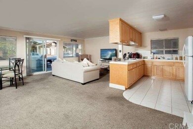 large spacious living room, with access to front p