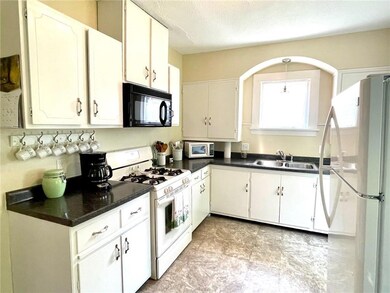 Bright, spacious kitchen space! Gas stove and Refrigerator included in the sale.