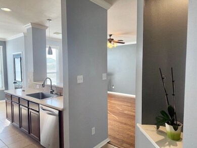Kitchen overlooks living area