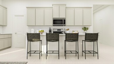 Kitchen with a breakfast bar, stainless steel appl