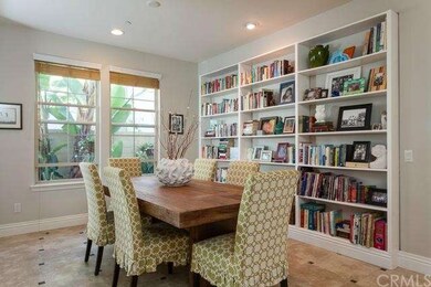Built-in library in dining room adds elegance and 