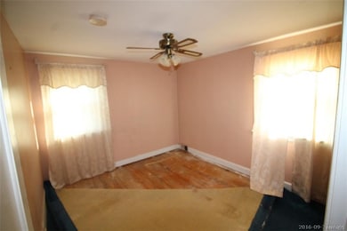 Bedroom 2 - Hardwood floors under carpet