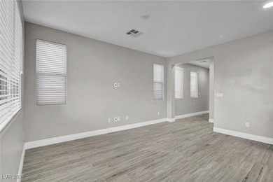 Unfurnished room with light wood finished floors