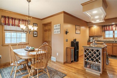 OPEN EAT-IN AREA IS PERFECT FOR A LARGE FARM TABLE