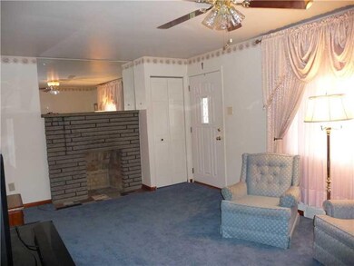 Exterior Front. Living room with fireplace