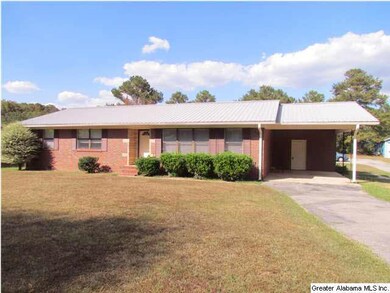 Full brick home with metal roof