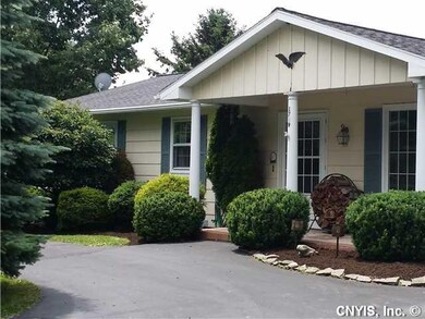 Exterior Front Attractive pillared entrance with d