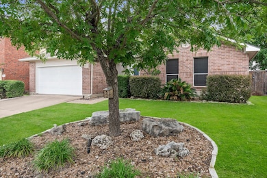 View of property hidden behind natural elements w