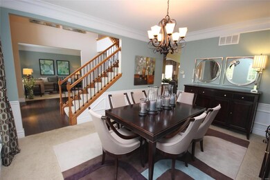 Large dining room with custom wainscoting and crow