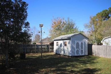 ~ Workshop which is tied down & elevated.