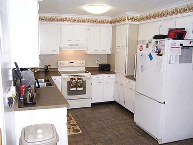 Kitchen. Lots of cupboard space, too!