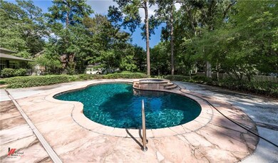 Large patio and inground salt water pool and spa.