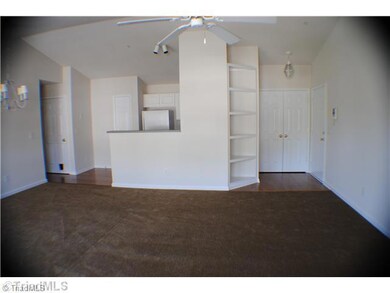 Living Room. Kitchen opens to a big Living room with built-in bookshelves.