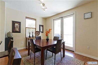 dining area with french doors opening to romantic 