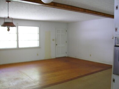 323 W Steeple Chase Rd, Greensboro, NC 27406 - photo 2