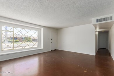 Front Room w/ Large Picture Window