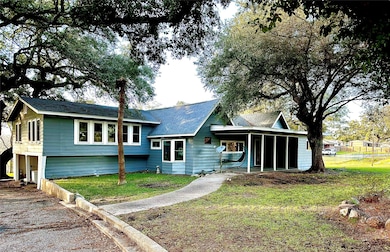 Another view of the house surrounded by gorgeous o