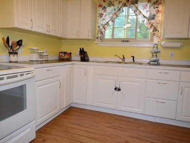Kitchen. Updated kitchen with ample white cabinetr
