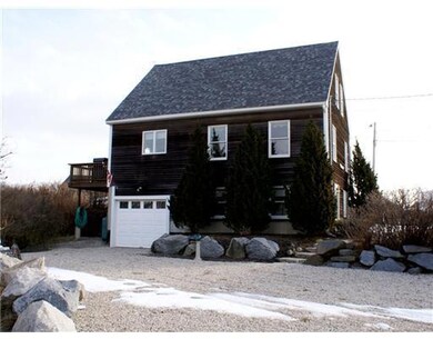 Exterior Back. Garage for ALL Toys