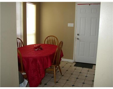 Kitchen. Another view of breakfast nook to show th