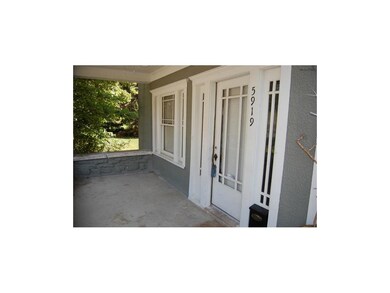 Entry to the first floor unit with front porch.