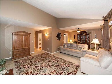 Living room with vaulted ceilings