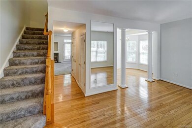 Coming in front door to Living room