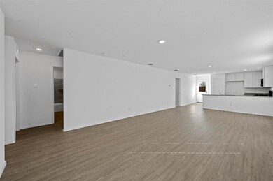 Unfurnished living room with light wood-type floor