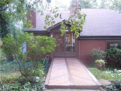 Exterior Front. Custom Wood double entry doors, wi