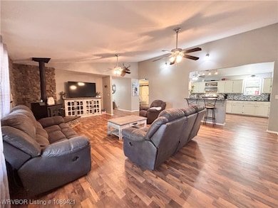 Spacious living room with wood stove
