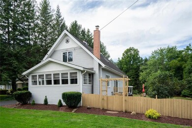 Beautiful landscaping and a fully fenced yard comp