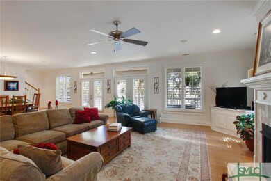Great Room open to Dining Room and Kitchen. Doors 