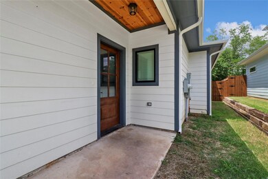 Entrance to property featuring fence