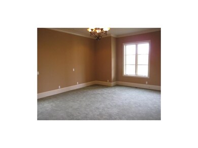 Spacious master suite boasts loads of natural ligh