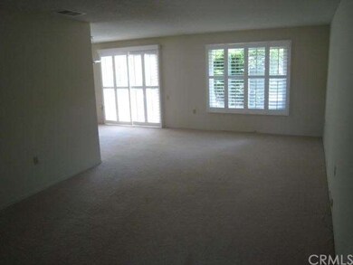 Spacious living room with seamless flow into the d