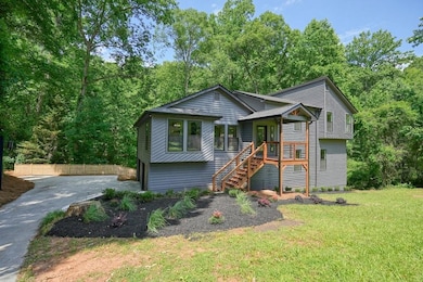 Front of home with a front lawn