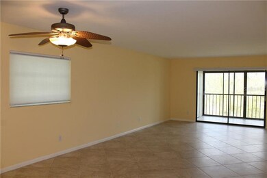Spacious living/dining room has lots of natural li